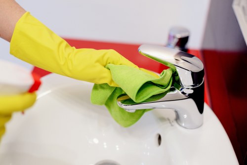 Deep cleaning team in Camden preparing equipment with safety gear and insurance-covered professional standards