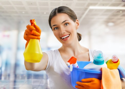 Local cleaner vacuuming a Camden townhouse living room